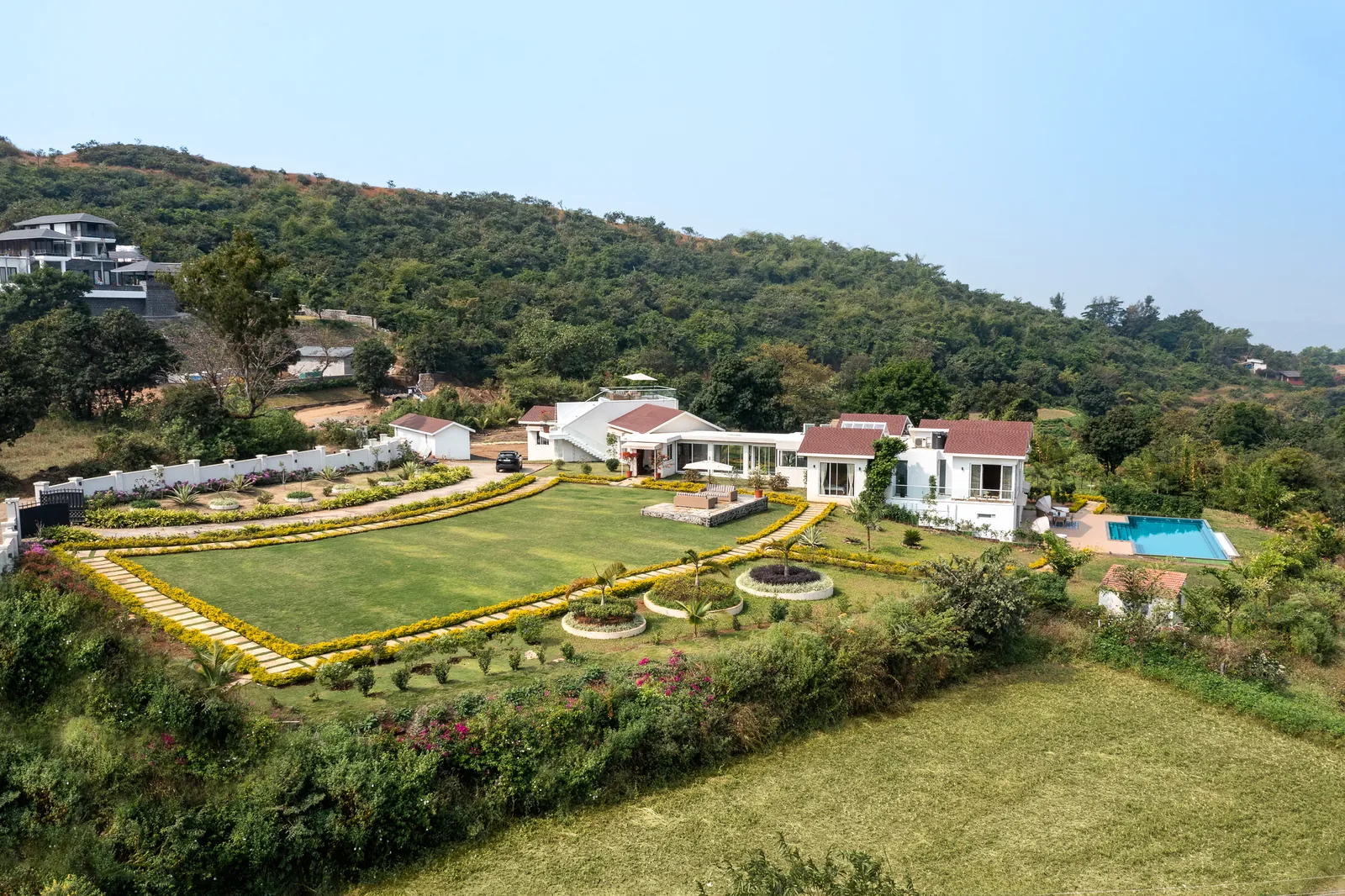 The house and its landscaped grounds from above