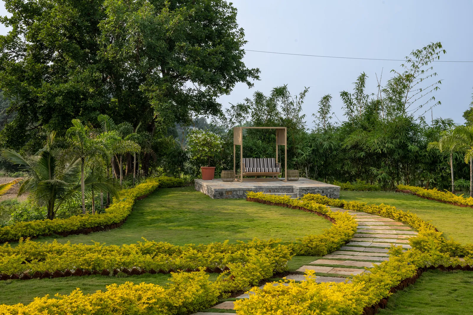 Garden paths and swing among the trees