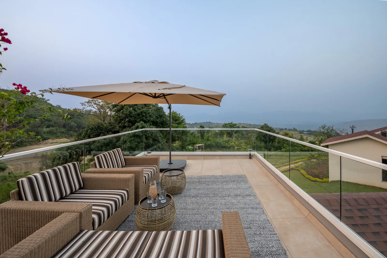 Roof terrace with outdoor seating and views across the valley